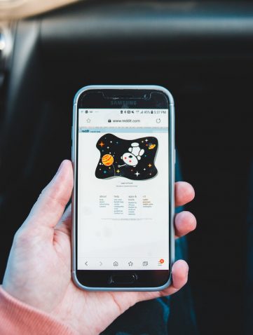 person holding black samsung android smartphone